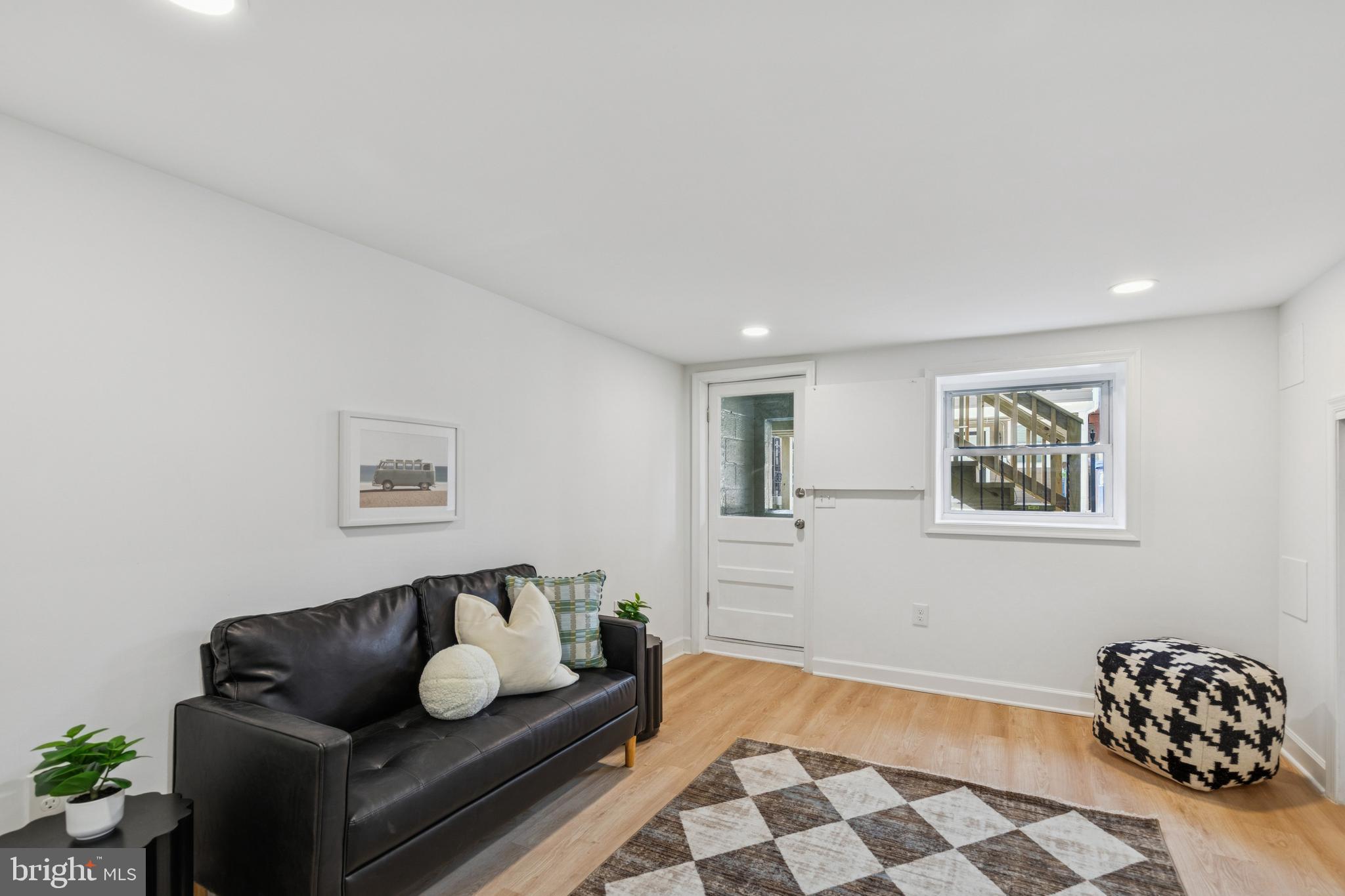 630 South Potomac Street Baltimore, MD 21224 - Photo 35 of 52 a living room with furniture and white walls