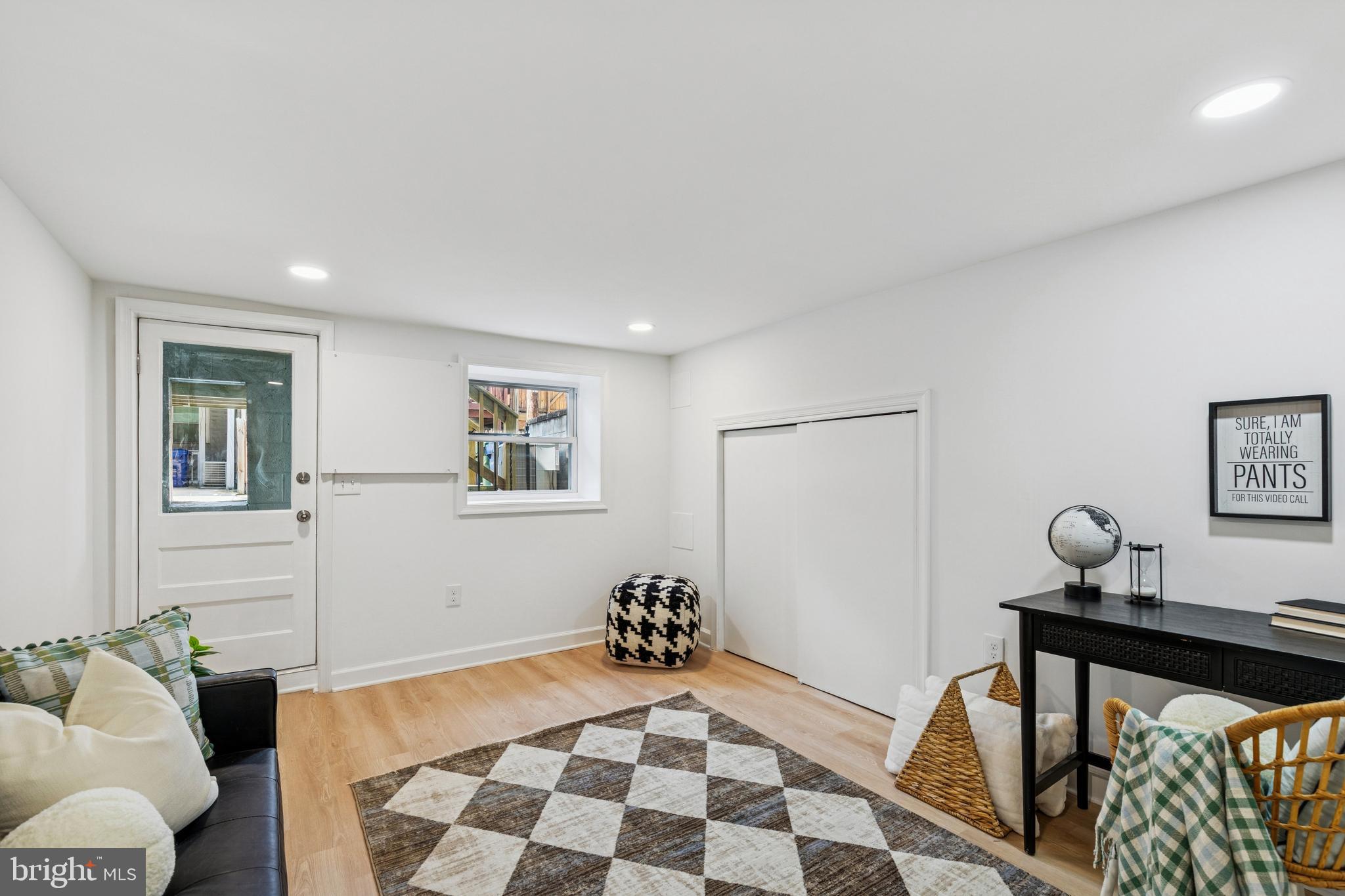 630 South Potomac Street Baltimore, MD 21224 - Photo 36 of 52 a bedroom with furniture and a window