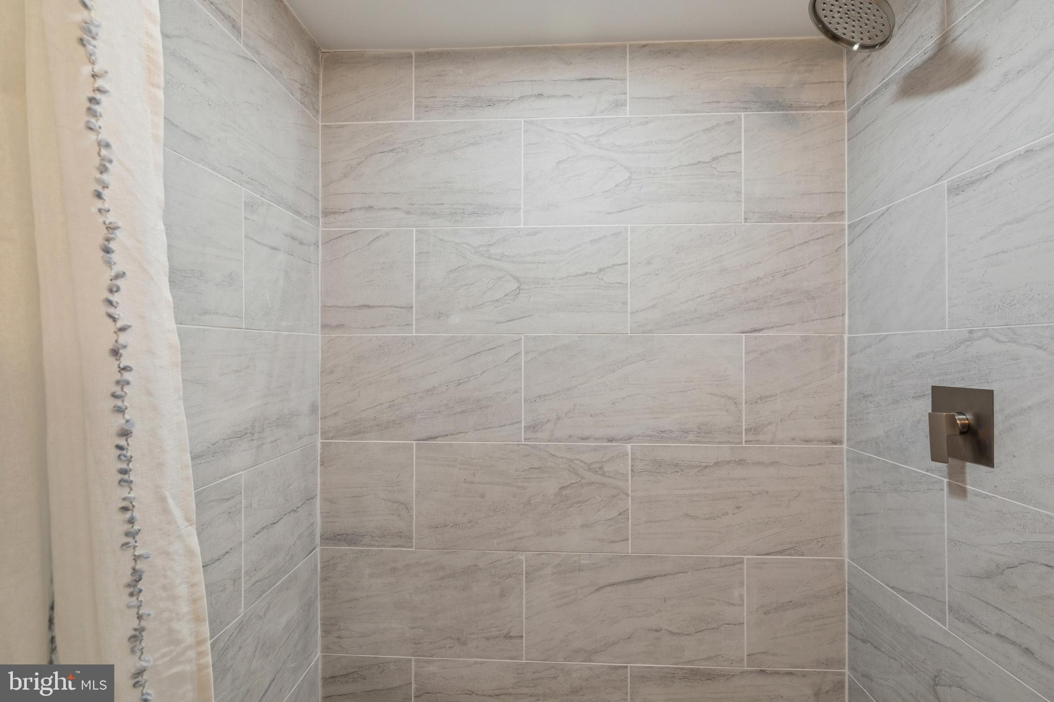 630 South Potomac Street Baltimore, MD 21224 - Photo 39 of 52 a bathroom with a shower