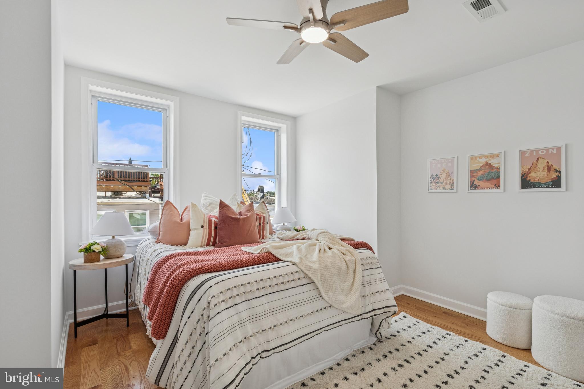 630 South Potomac Street Baltimore, MD 21224 - Photo 43 of 52 a bedroom with a bed and a window