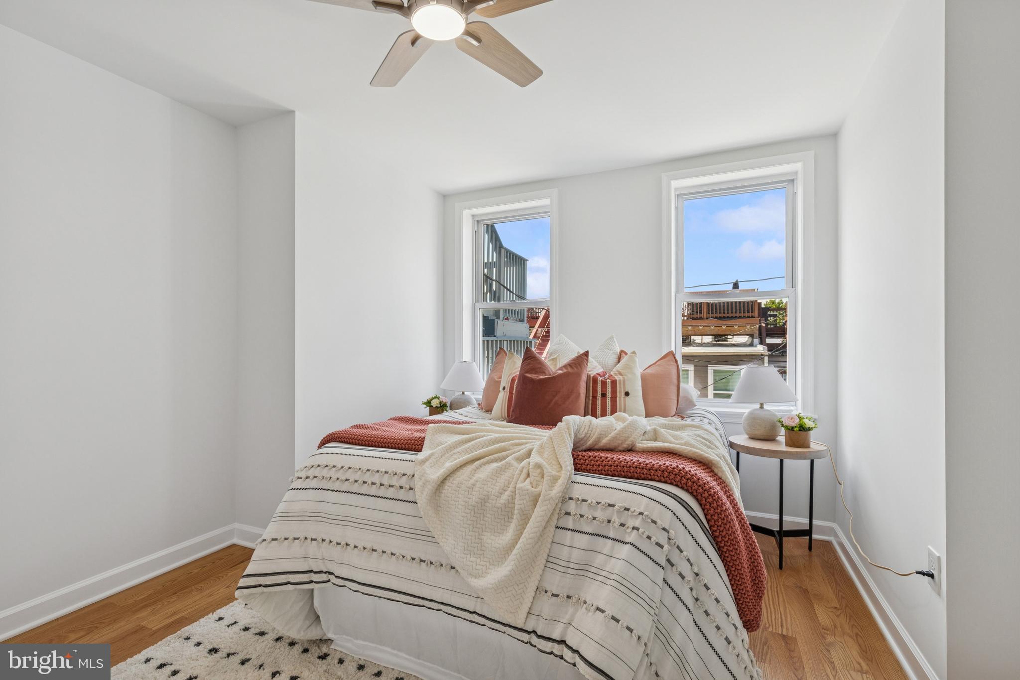 630 South Potomac Street Baltimore, MD 21224 - Photo 45 of 52 a bedroom with a bed and a window