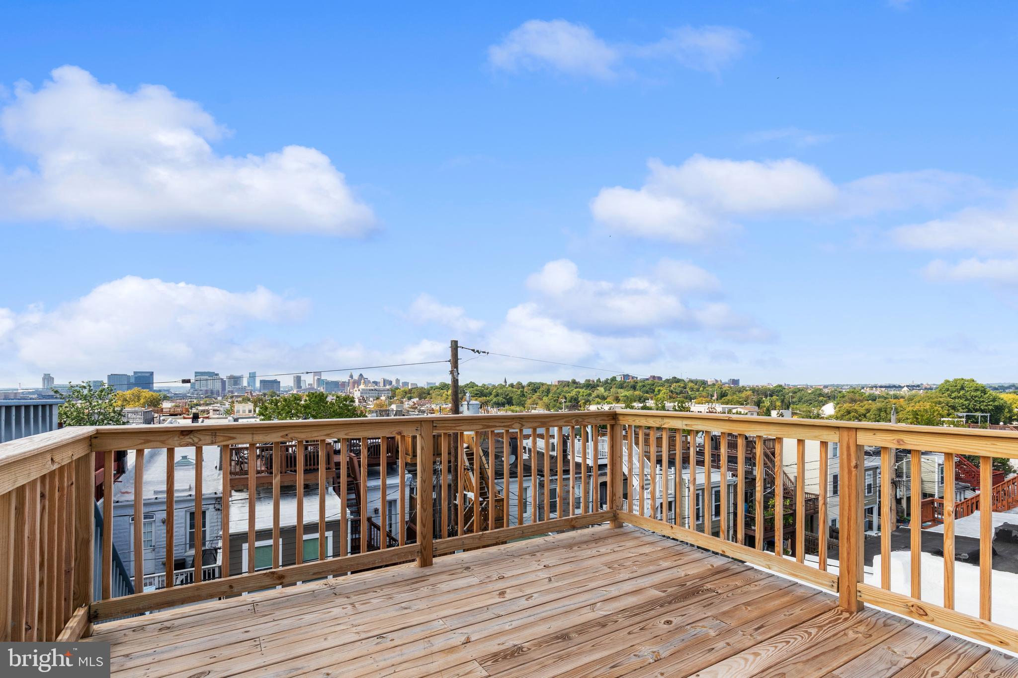 630 South Potomac Street Baltimore, MD 21224 - Photo 48 of 52 a view of city from a roof deck