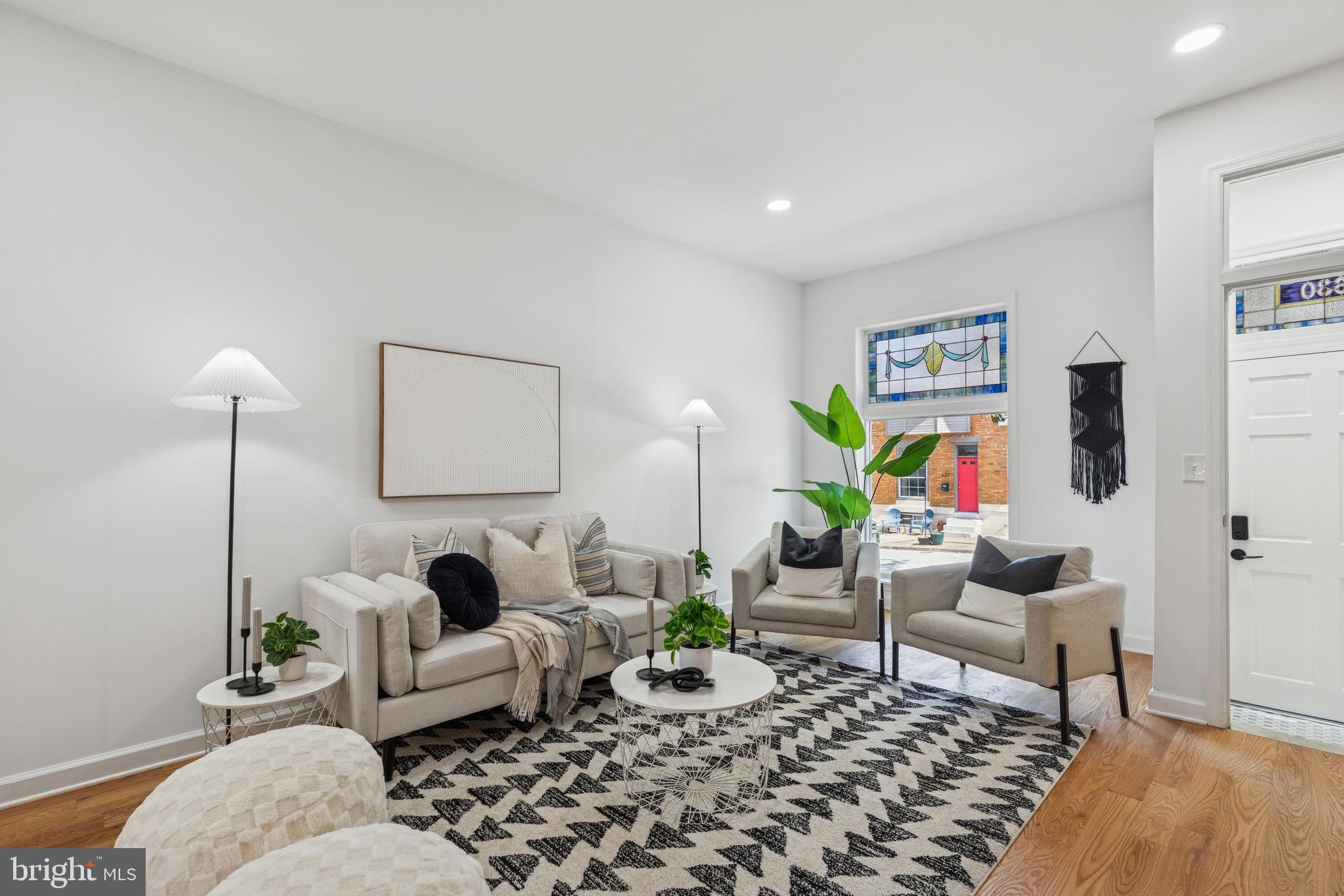 630 South Potomac Street Baltimore, MD 21224 - Photo 5 of 52 a living room with furniture and wooden floor