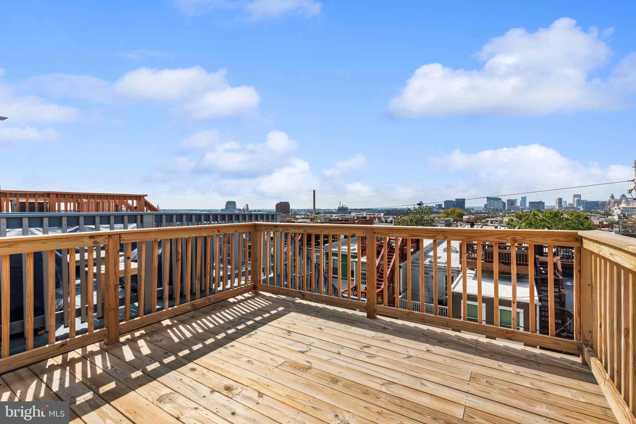 630 South Potomac Street Baltimore, MD 21224 - Photo 51 of 52 a view of city from a roof deck