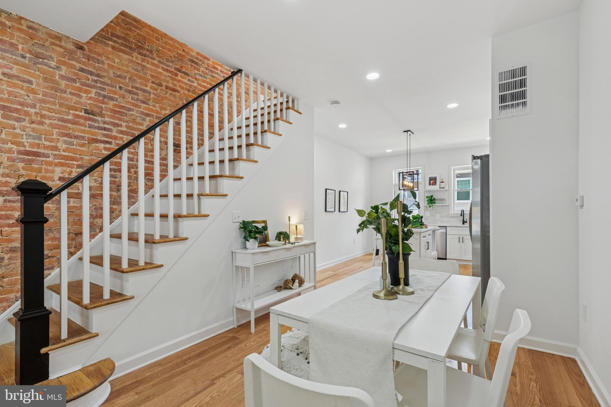 630 South Potomac Street Baltimore, MD 21224 - Photo 10 of 52 a view of kitchen with furniture and wooden floor
