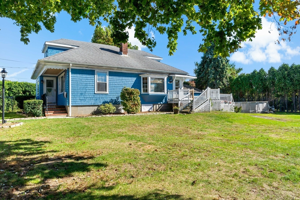 37 Merton Street Somerset, MA 02726 - Photo 2 of 36 a view of a house with a yard and sitting area