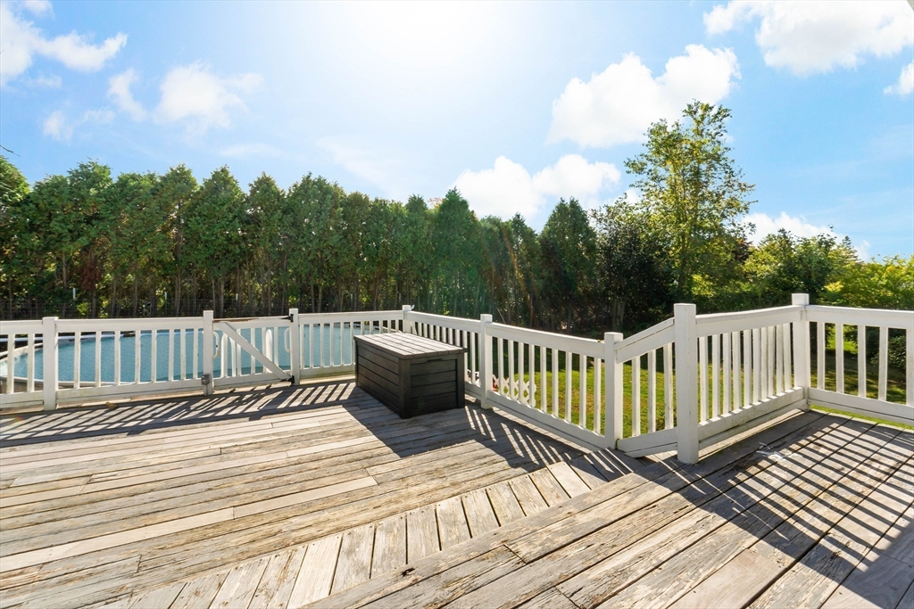 37 Merton Street Somerset, MA 02726 - Photo 26 of 36 a view of a wooden roof deck