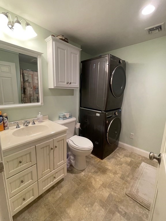 46 Quaker Lane Rochester, MA 02770 - Photo 13 of 25 a bathroom with a toilet sink and mirror