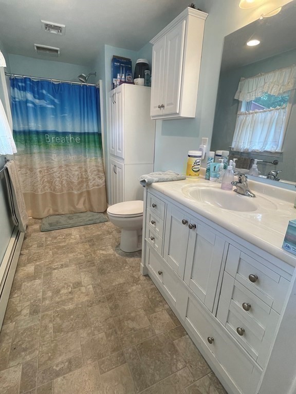 46 Quaker Lane Rochester, MA 02770 - Photo 17 of 25 a bathroom with a sink toilet and mirror