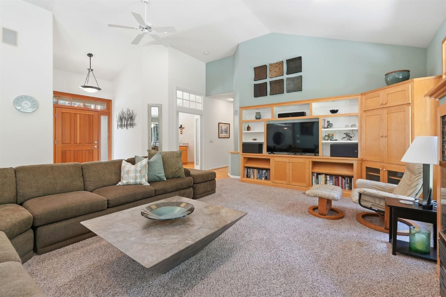 10711 Murchie Mine Road Nevada City, CA 95959 - Photo 12 of 71 a living room with furniture and a flat screen tv