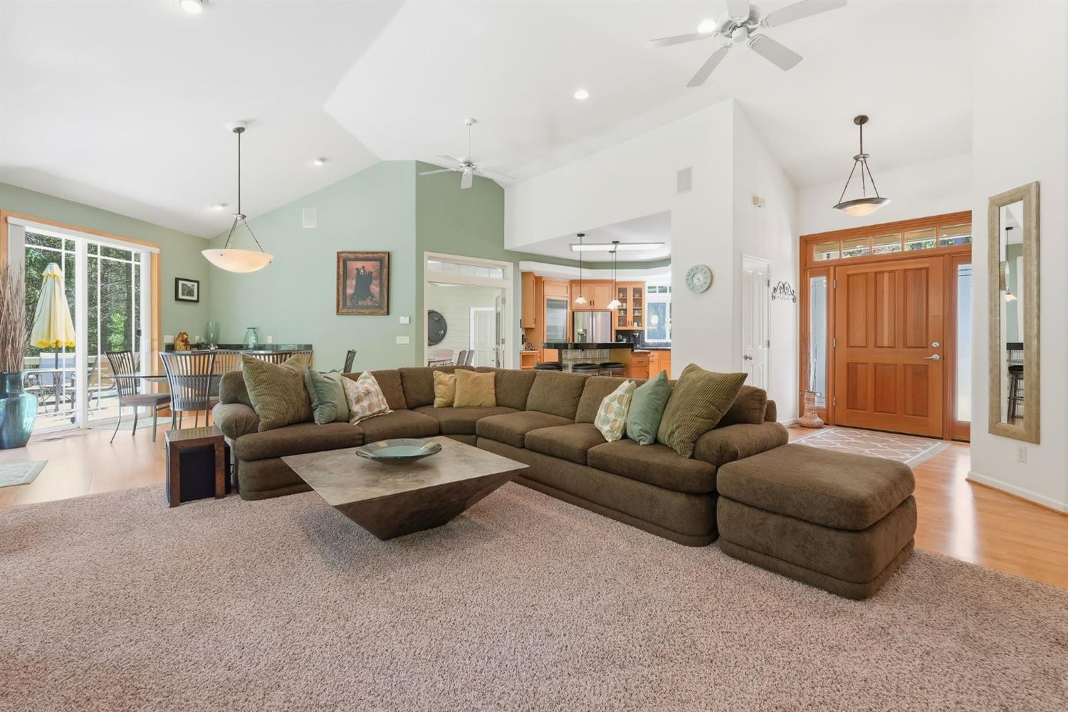 10711 Murchie Mine Road Nevada City, CA 95959 - Photo 15 of 71 a living room with furniture and a chandelier