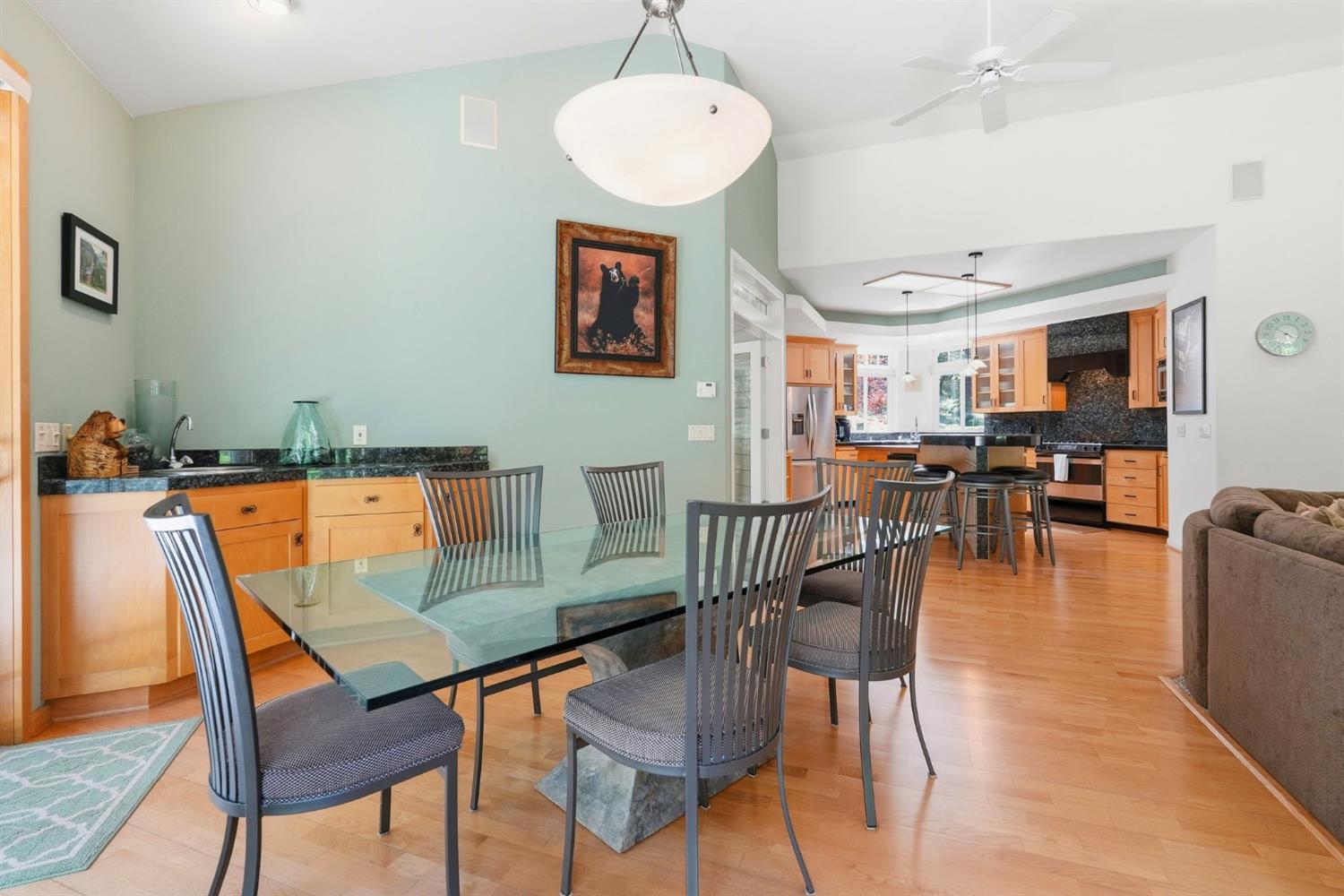 10711 Murchie Mine Road Nevada City, CA 95959 - Photo 23 of 71 a dining room with furniture and wooden floor
