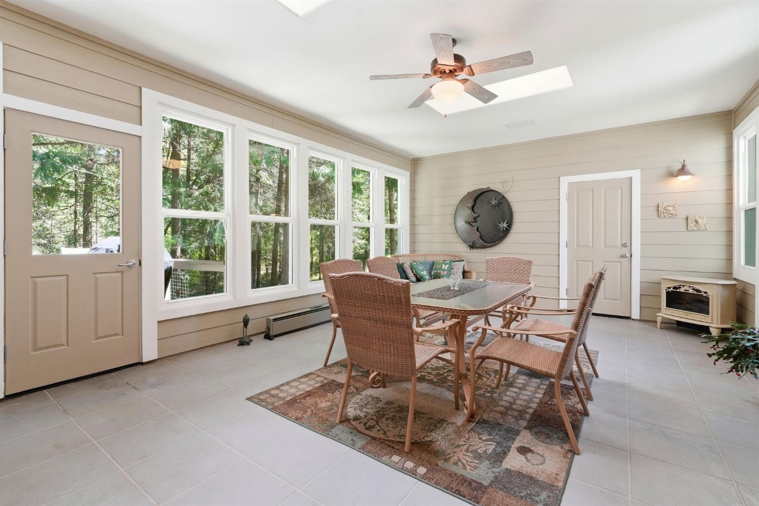 10711 Murchie Mine Road Nevada City, CA 95959 - Photo 27 of 71 a view of a dining room with furniture window and outside view