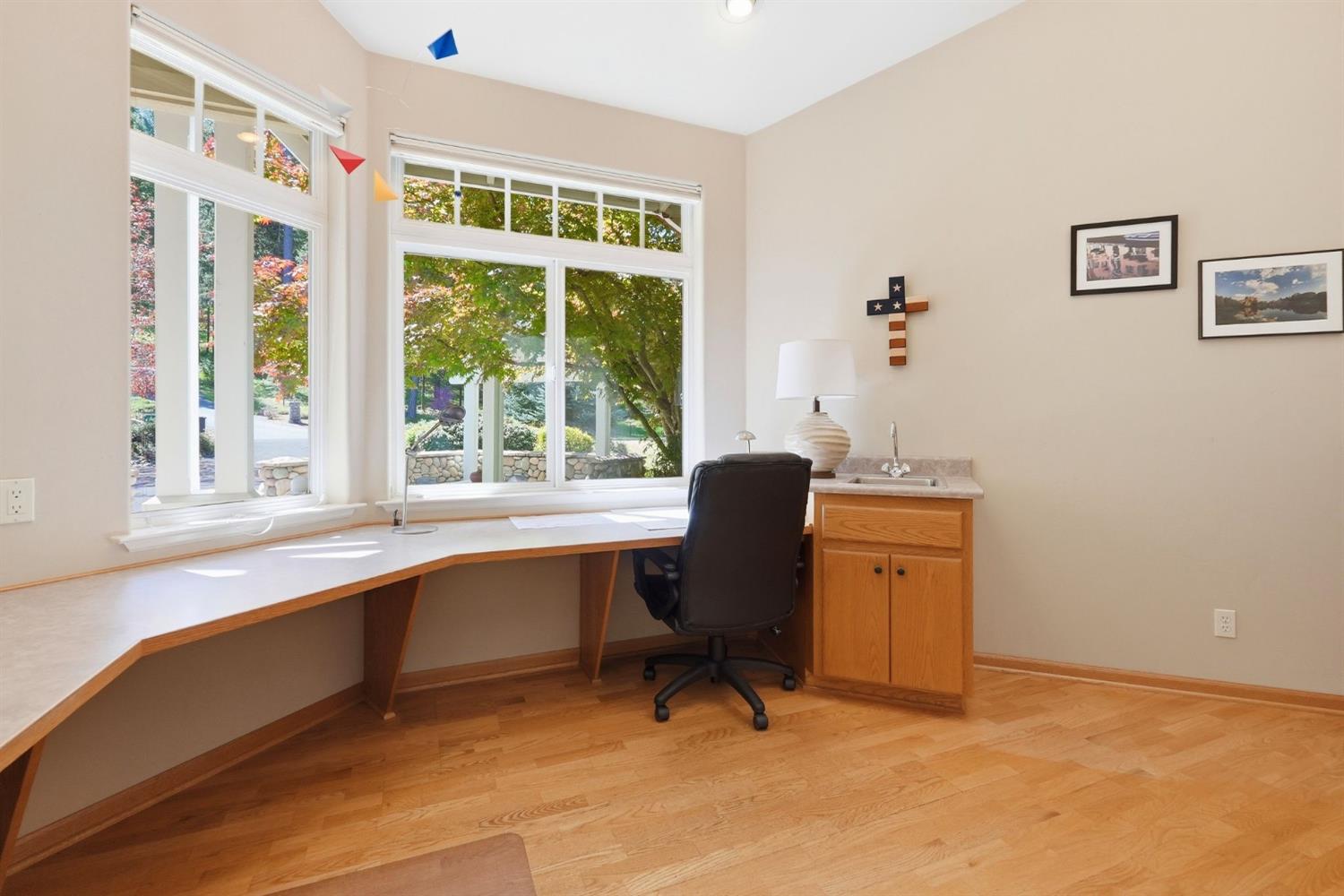 10711 Murchie Mine Road Nevada City, CA 95959 - Photo 29 of 71 a view of a workspace with furniture and a window