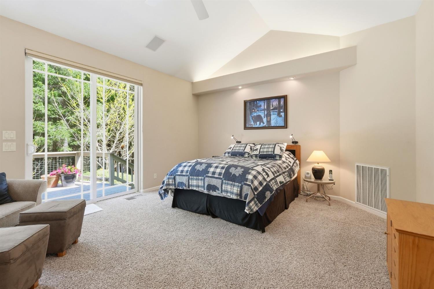 10711 Murchie Mine Road Nevada City, CA 95959 - Photo 32 of 71 a bedroom with a bed and a couch next to a window