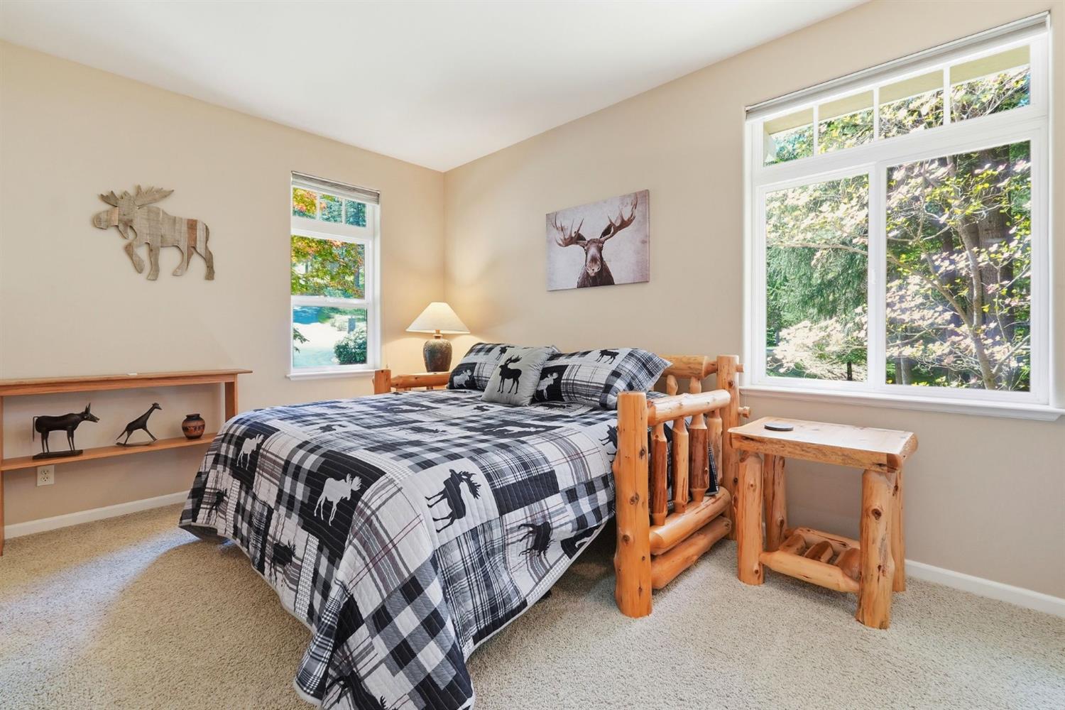 10711 Murchie Mine Road Nevada City, CA 95959 - Photo 41 of 71 a bedroom with a bed and a window