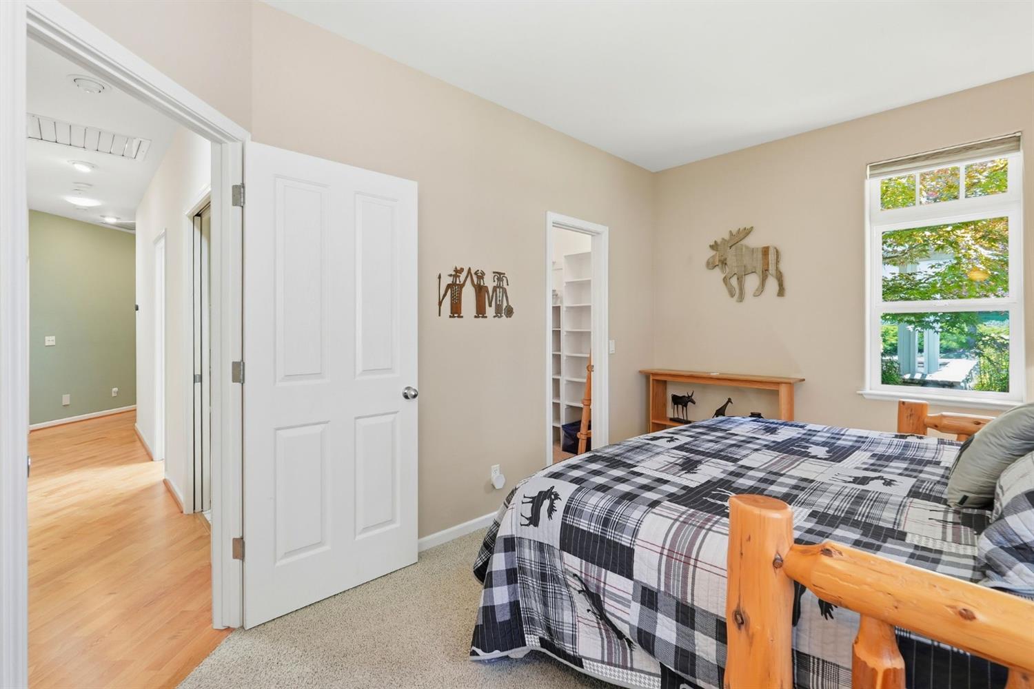 10711 Murchie Mine Road Nevada City, CA 95959 - Photo 42 of 71 a bedroom with a bed and a window