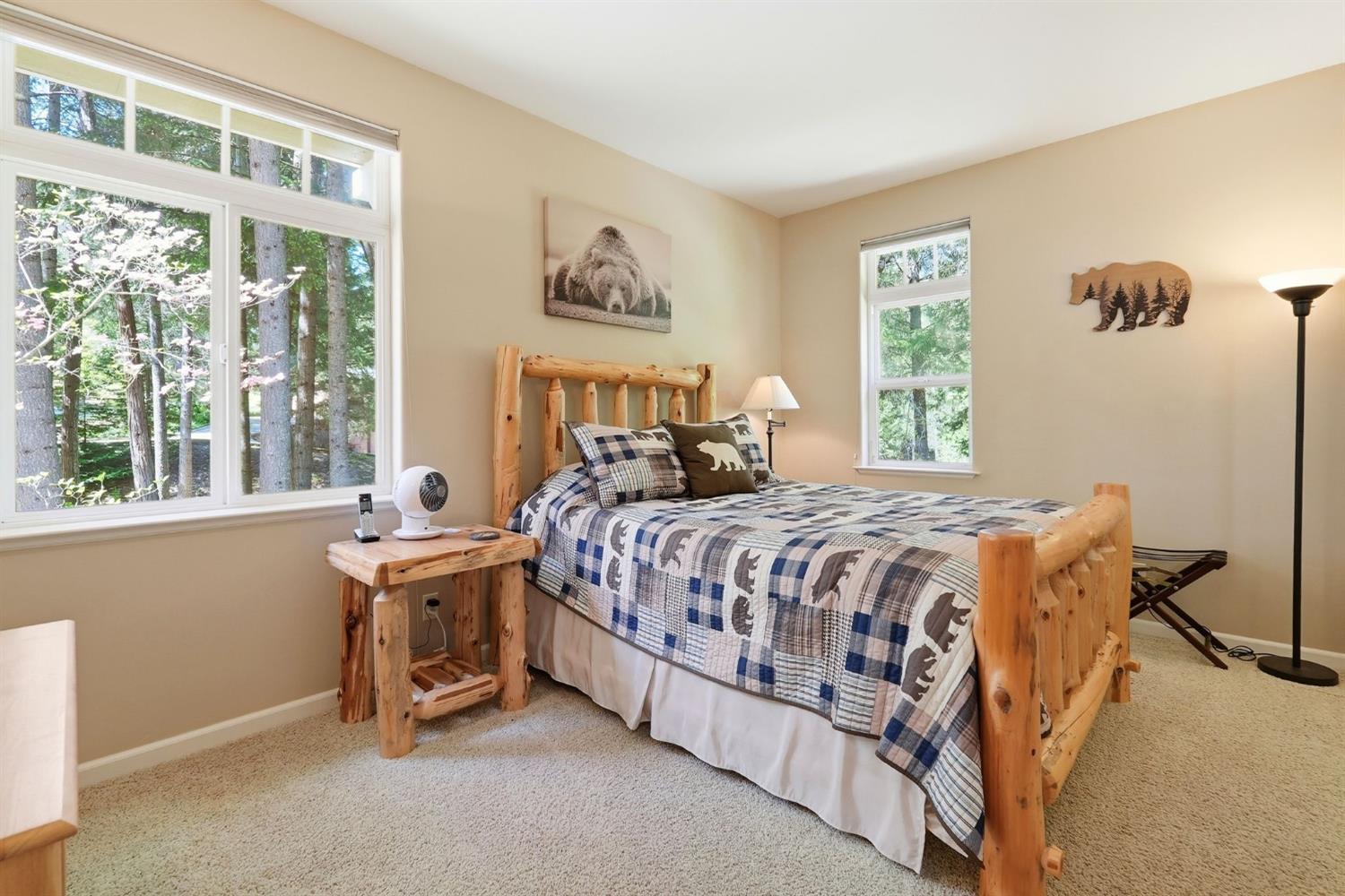10711 Murchie Mine Road Nevada City, CA 95959 - Photo 43 of 71 a bedroom with a bed and a window