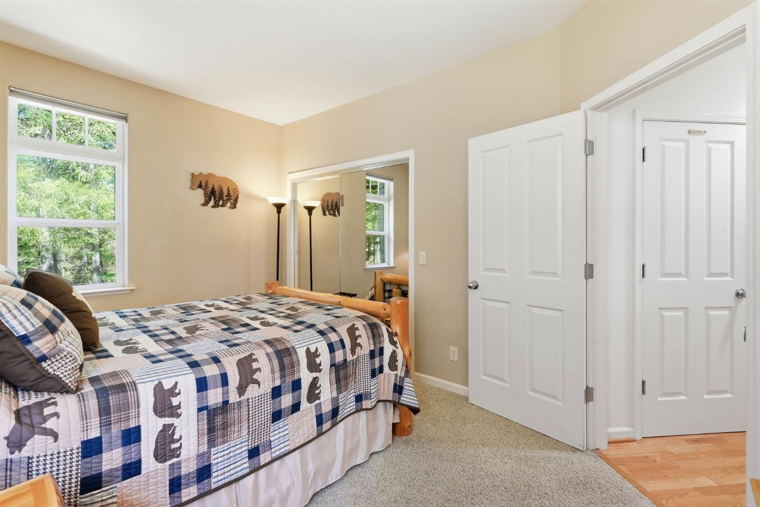 10711 Murchie Mine Road Nevada City, CA 95959 - Photo 44 of 71 a bedroom with a bed and a window