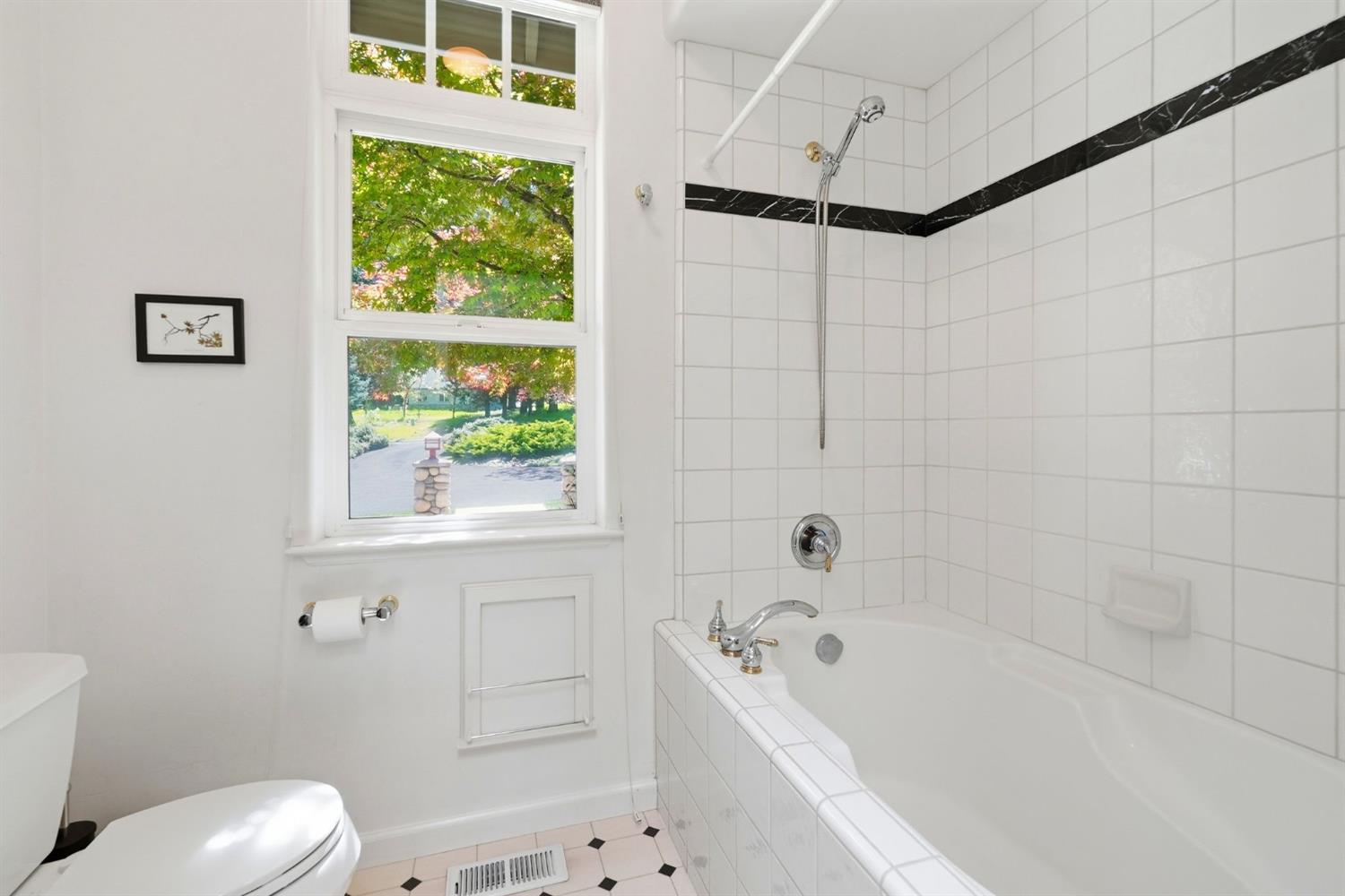 10711 Murchie Mine Road Nevada City, CA 95959 - Photo 46 of 71 a bathroom with a bathtub and window