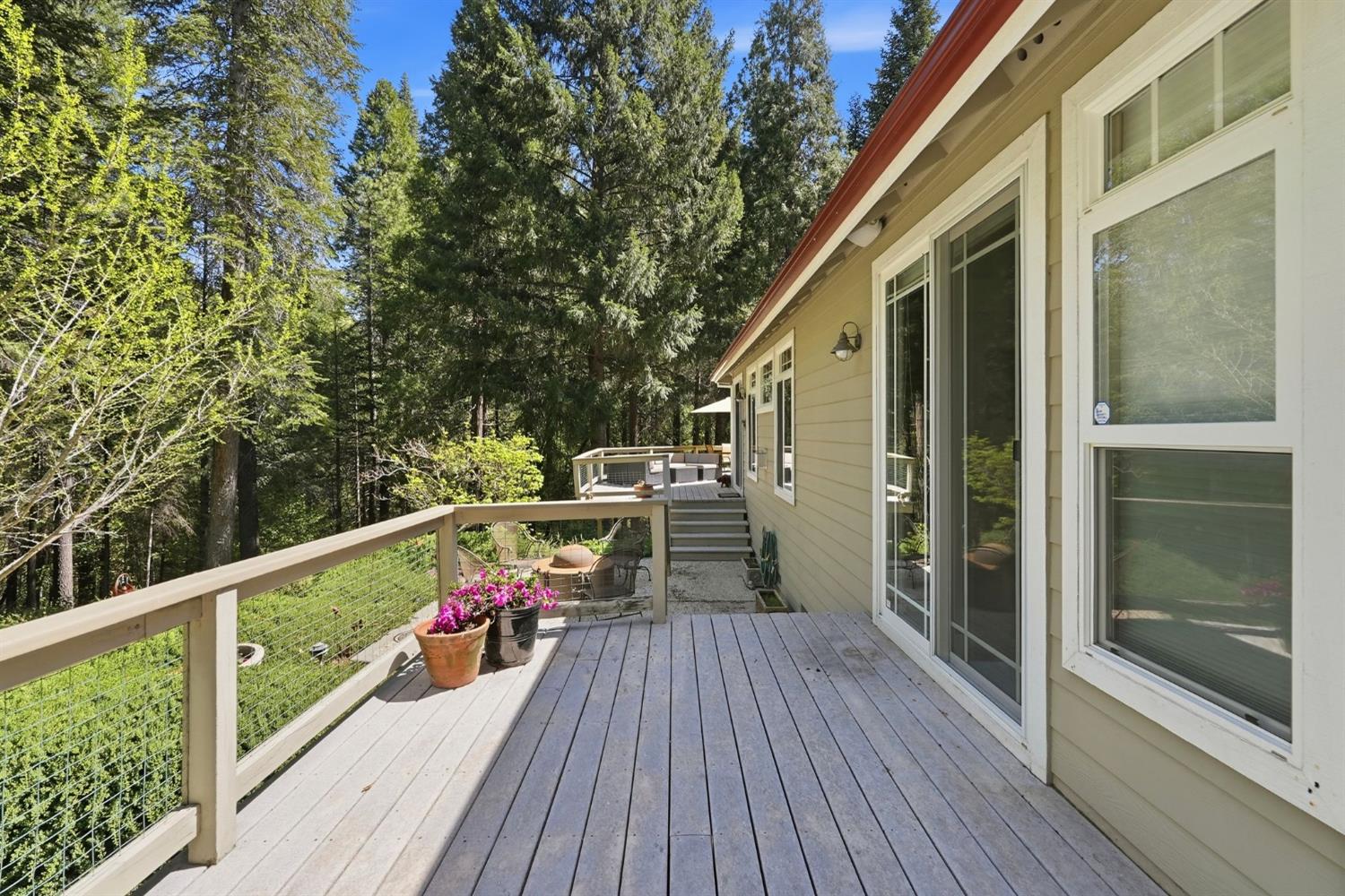 10711 Murchie Mine Road Nevada City, CA 95959 - Photo 55 of 71 a view of a balcony with wooden floor and outdoor space