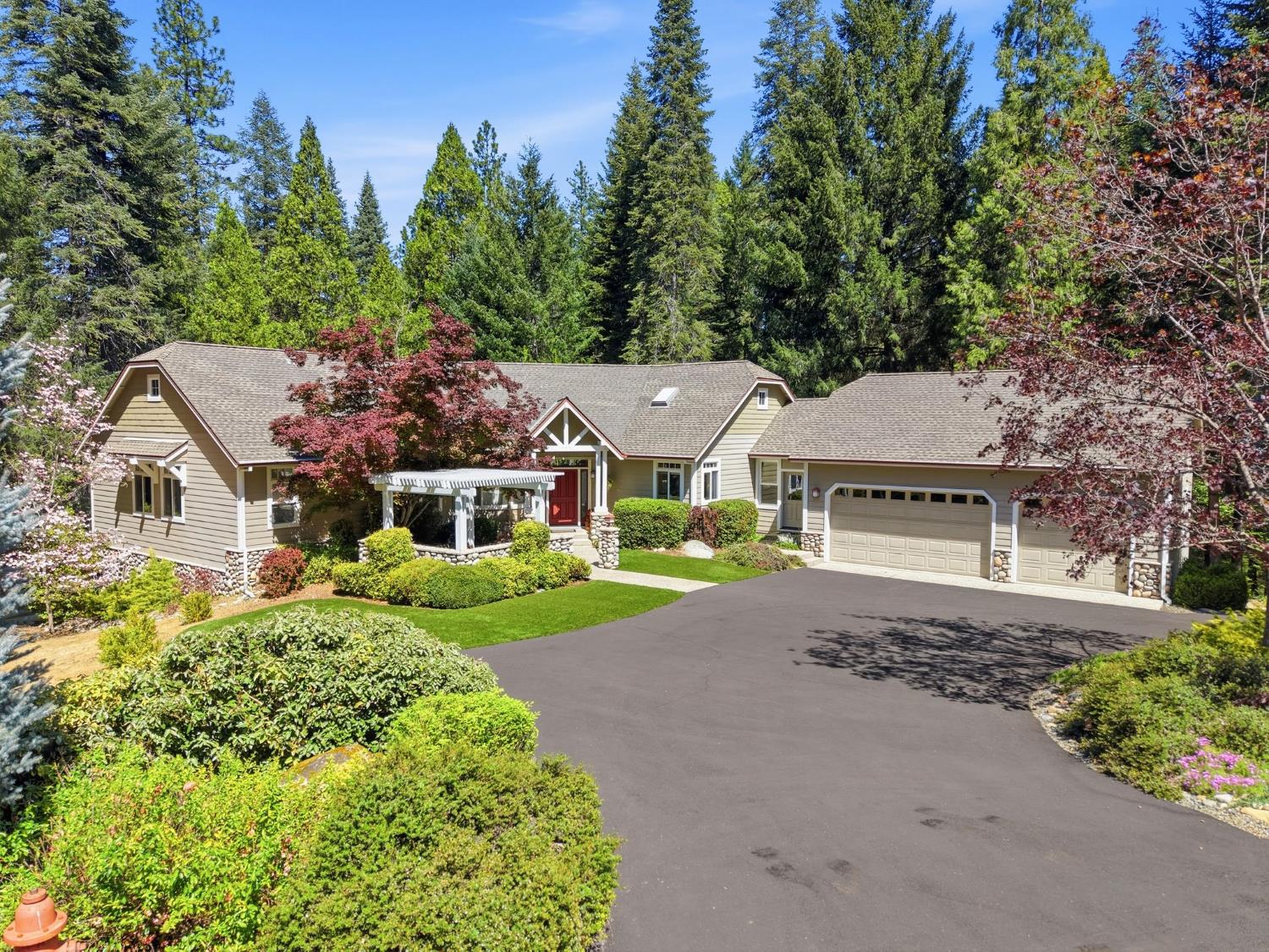 10711 Murchie Mine Road Nevada City, CA 95959 - Photo 61 of 71 a front view of a house with a garden