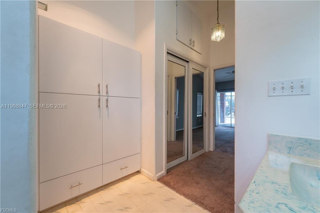 845 Quail Run LaBelle, FL 33935 - Photo 16 of 29 a view of a hallway with closet