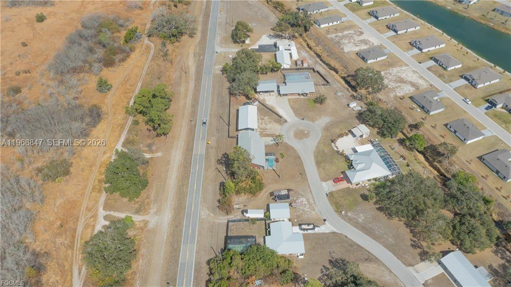 845 Quail Run LaBelle, FL 33935 - Photo 27 of 29 view of a house with a yard