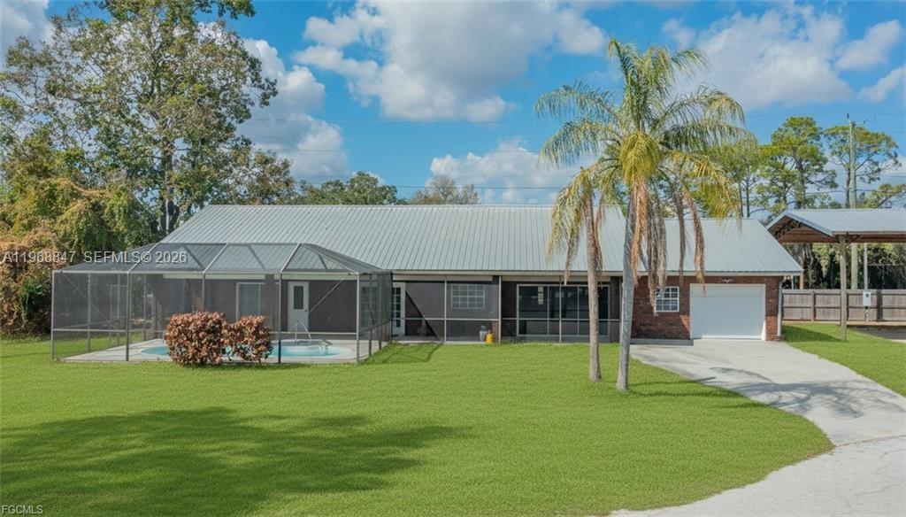 845 Quail Run LaBelle, FL 33935 - Photo 4 of 29 a front view of house with yard