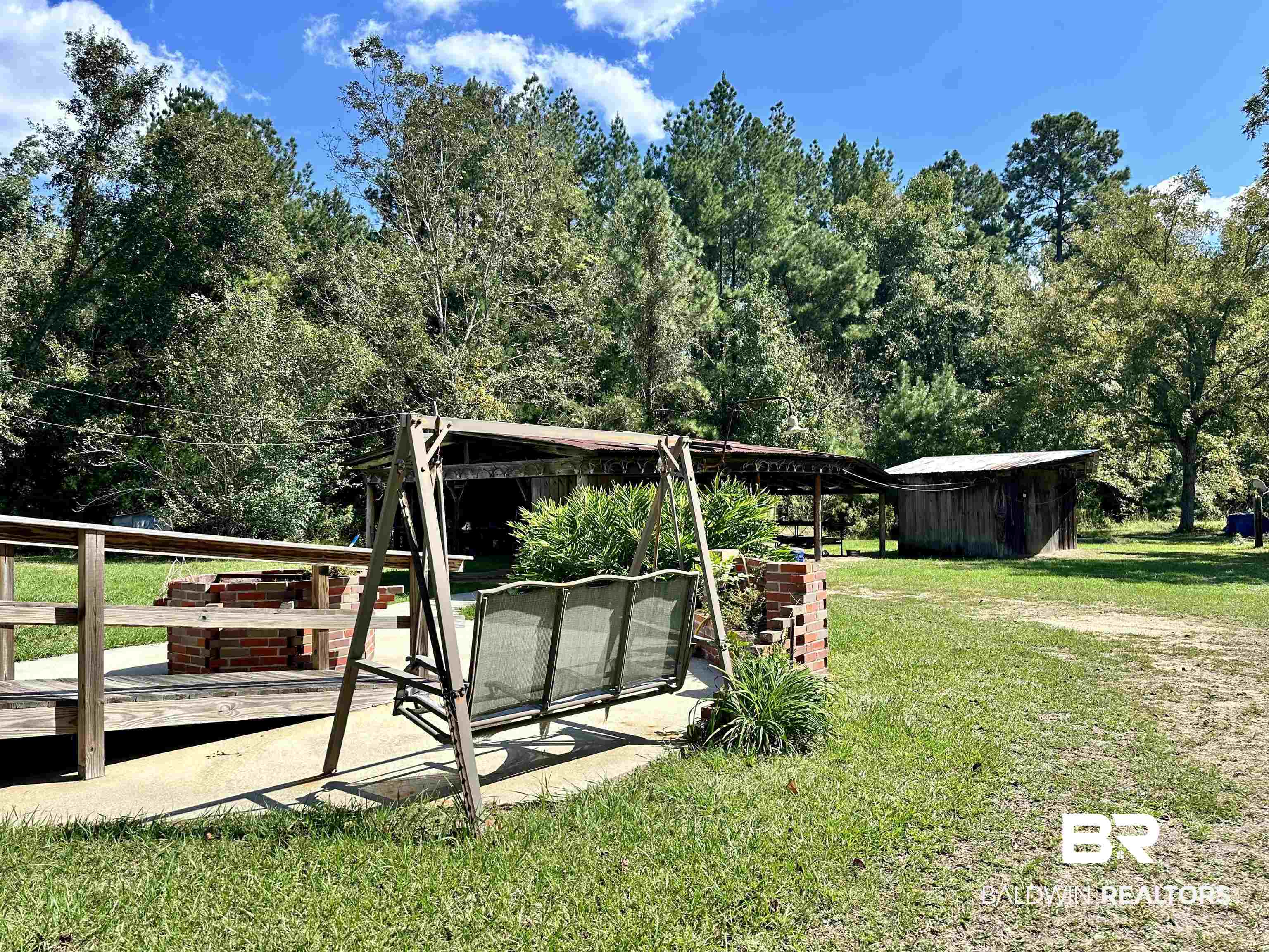 1081 Jay Road Brewton, AL 36426 - Photo 19 of 19 View of yard with a shed