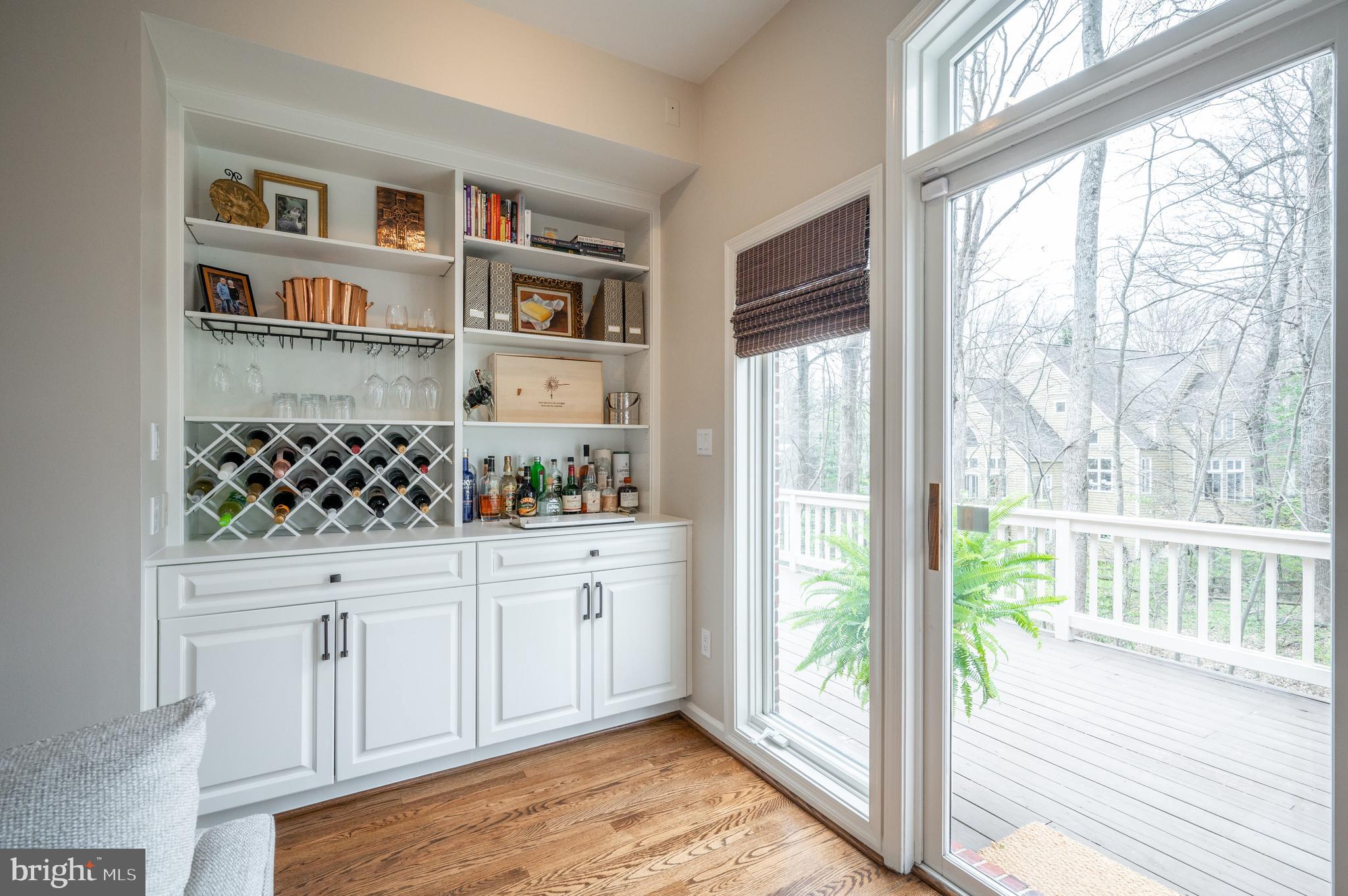 11513 Hemingway Drive Reston, VA 20194 - Photo 16 of 54 Custom built-in shelves main level