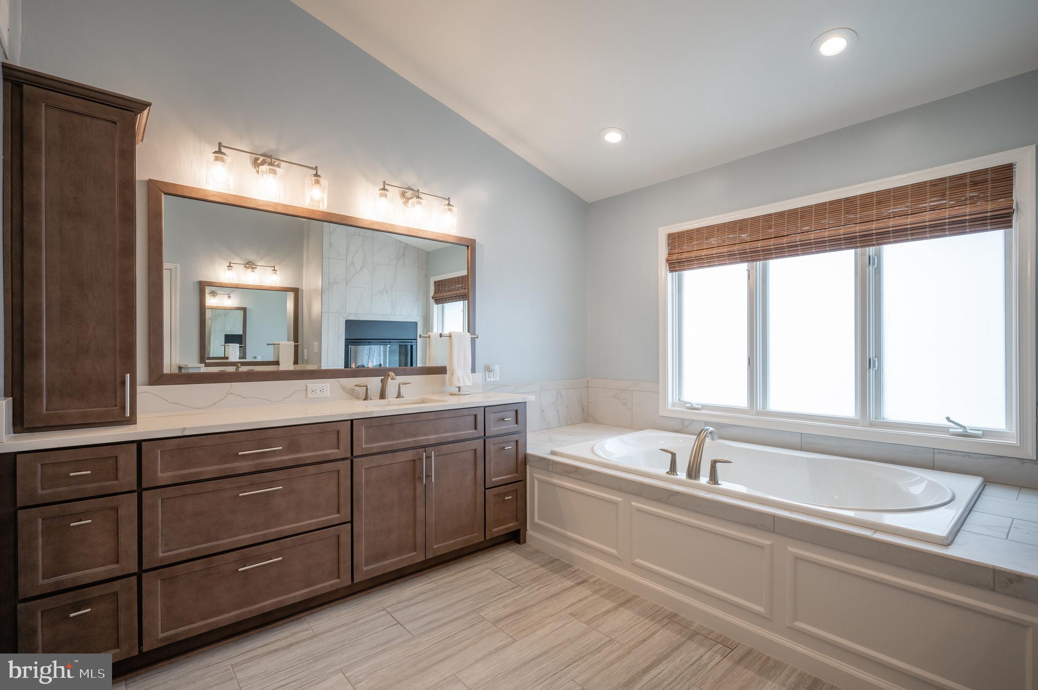 11513 Hemingway Drive Reston, VA 20194 - Photo 25 of 54 A genuine spa bath & look through gas fireplace