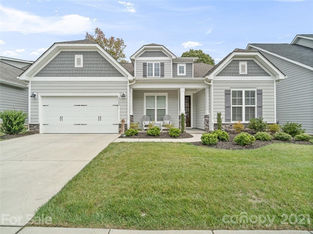 2822 Walker Road Matthews, NC 28105 - Photo 1 of 47 a front view of a house with garden