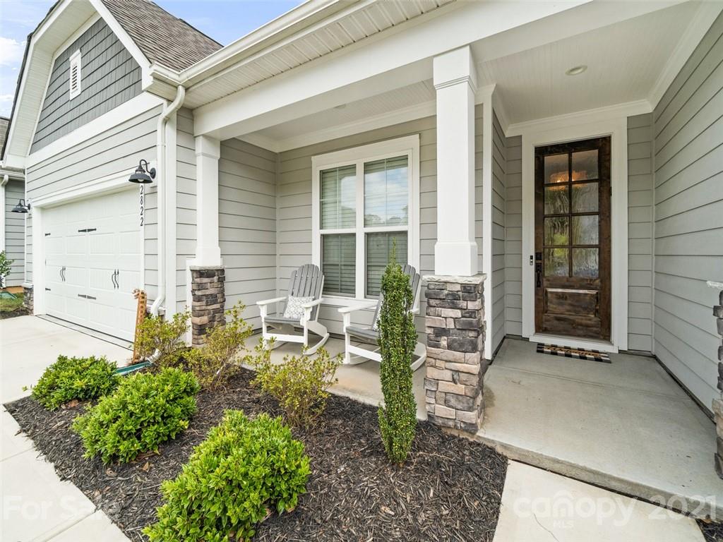 2822 Walker Road Matthews, NC 28105 - Photo 2 of 47 a view of a chairs in front of house