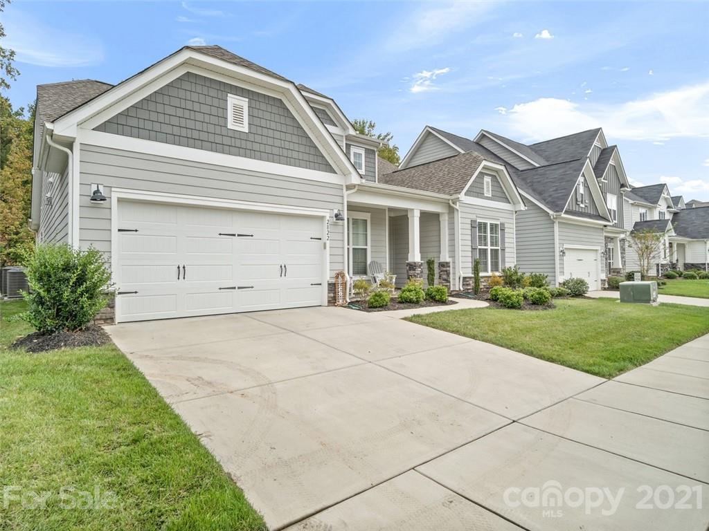 2822 Walker Road Matthews, NC 28105 - Photo 3 of 47 a front view of a house with a yard