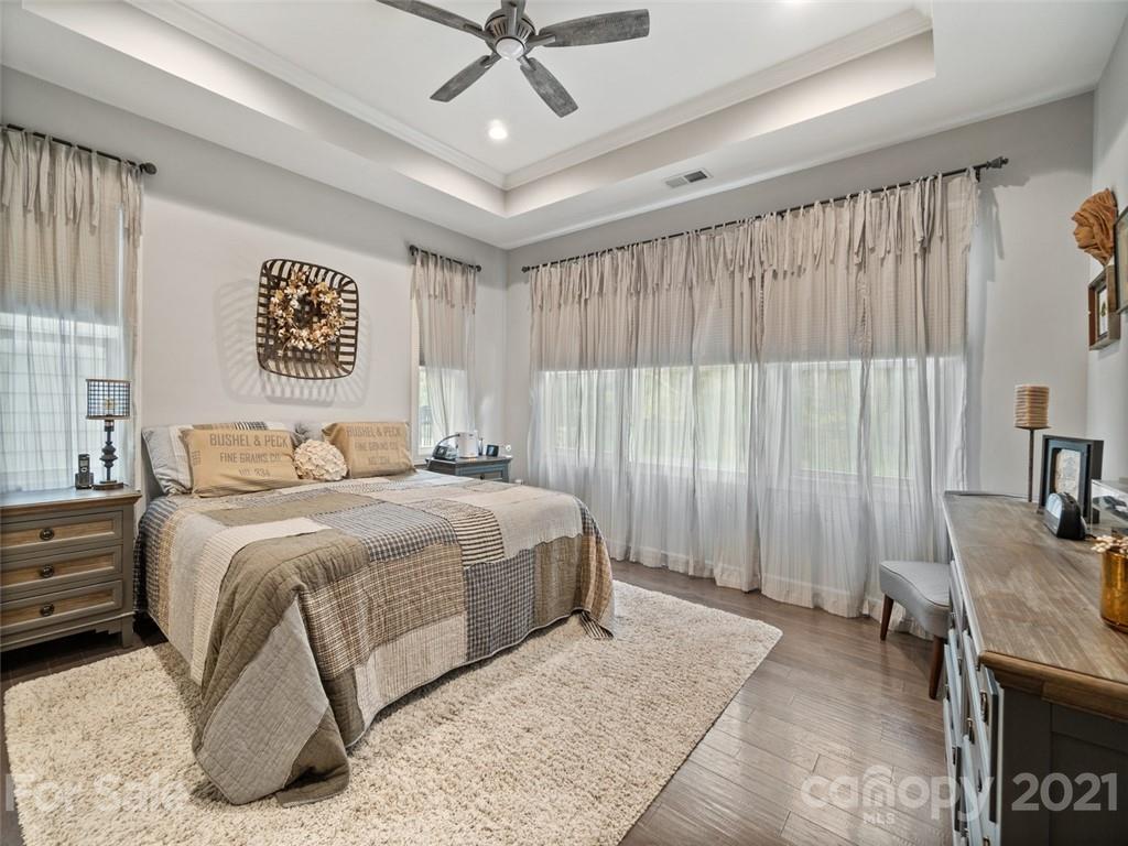 2822 Walker Road Matthews, NC 28105 - Photo 25 of 47 a bedroom with a bed and a table