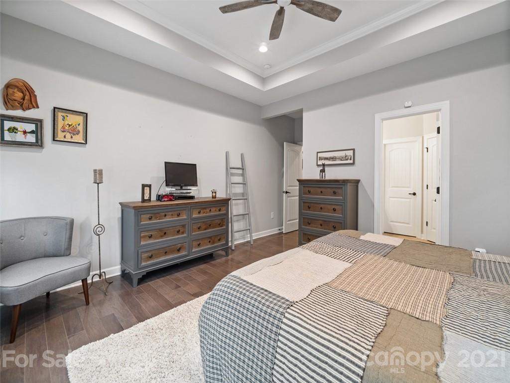 2822 Walker Road Matthews, NC 28105 - Photo 26 of 47 a bedroom with a bed and furniture