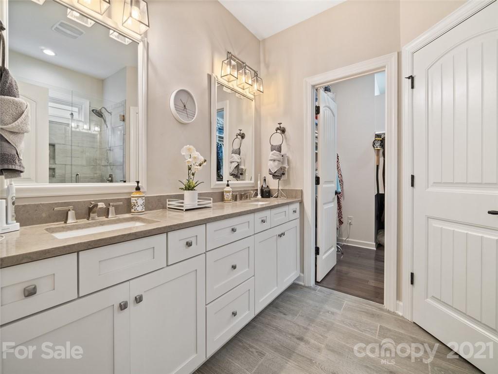 2822 Walker Road Matthews, NC 28105 - Photo 27 of 47 a spacious bathroom with double sink and a mirror