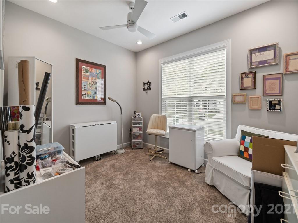 2822 Walker Road Matthews, NC 28105 - Photo 30 of 47 a bed room with furniture and a window