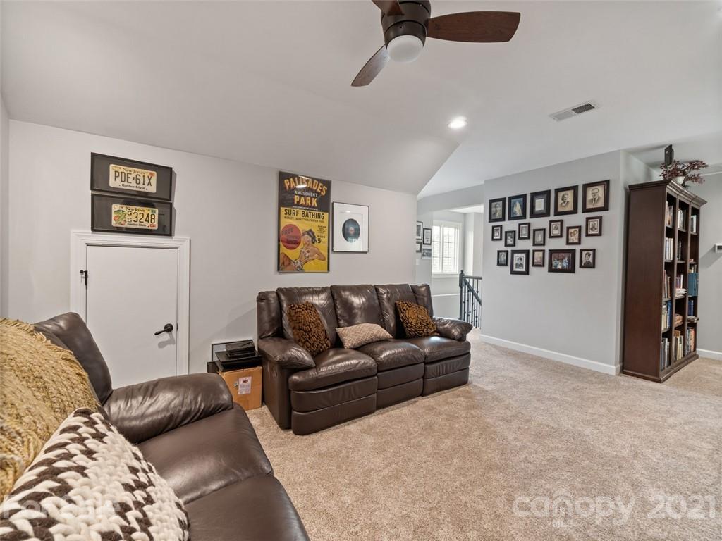 2822 Walker Road Matthews, NC 28105 - Photo 37 of 47 a living room with furniture and a window