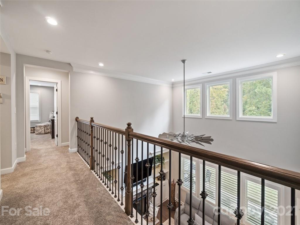 2822 Walker Road Matthews, NC 28105 - Photo 38 of 47 a view of hallway with stairs