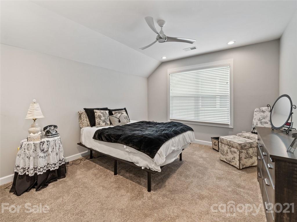 2822 Walker Road Matthews, NC 28105 - Photo 39 of 47 a bedroom with a bed and window