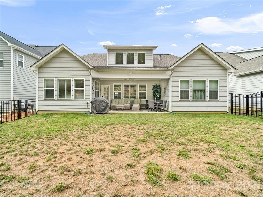 2822 Walker Road Matthews, NC 28105 - Photo 42 of 47 a front view of a house with garden