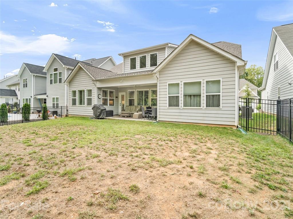 2822 Walker Road Matthews, NC 28105 - Photo 46 of 47 a front view of a house with a garden