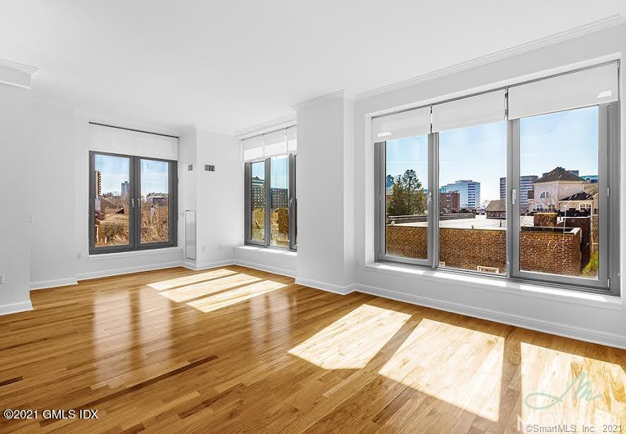 70 Forest Street, Unit 5E Stamford, CT 06901 - Photo 2 of 15 a view of an empty room and window