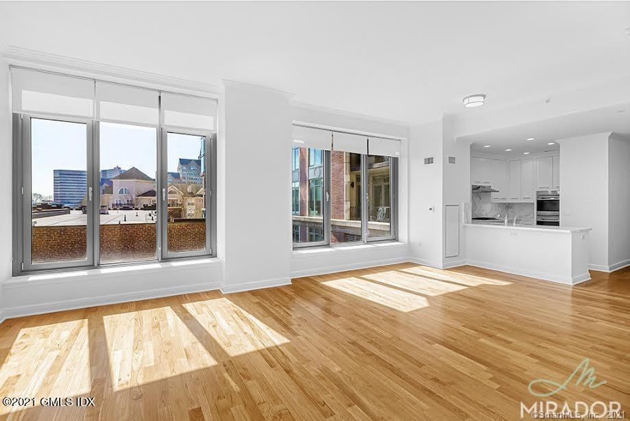 70 Forest Street, Unit 5E Stamford, CT 06901 - Photo 3 of 15 a view of an empty room with a window