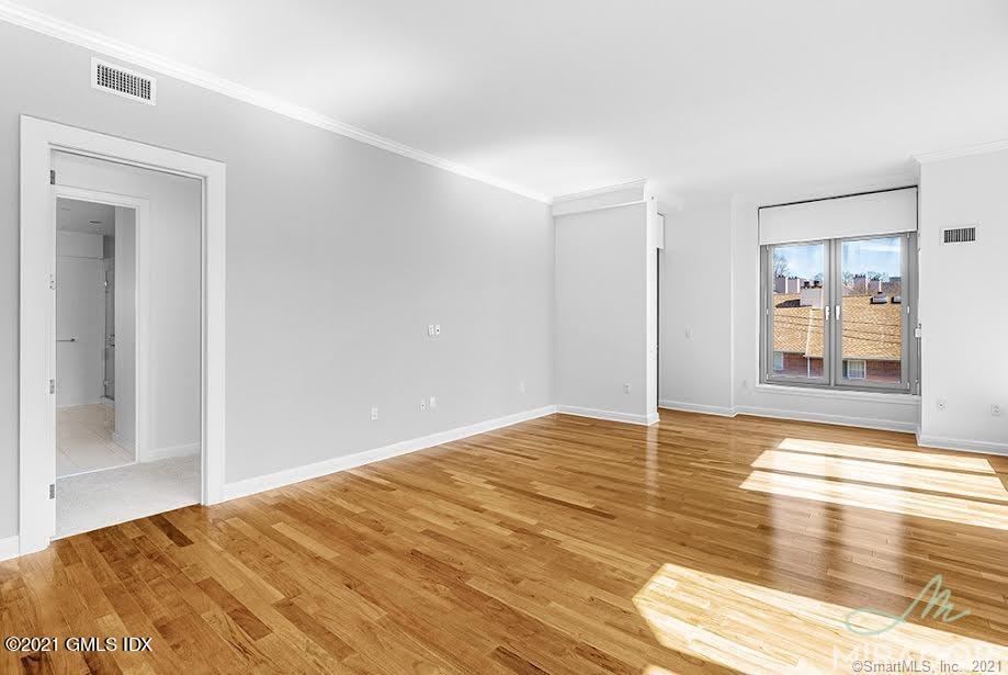 70 Forest Street, Unit 5E Stamford, CT 06901 - Photo 8 of 15 a view of an empty room and window