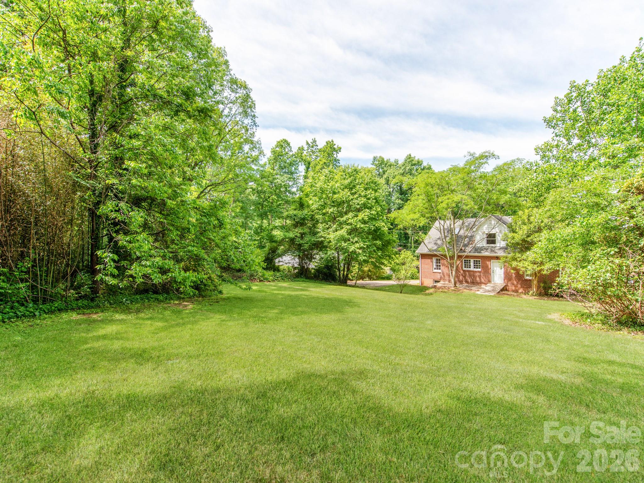 113 Falls Street Morganton, NC 28655 - Photo 31 of 33 a house with a garden