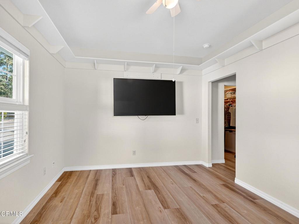 18970 Quail Lane Fort Bragg, CA 95437 - Photo 16 of 36 a view of empty room with wooden floor and fan