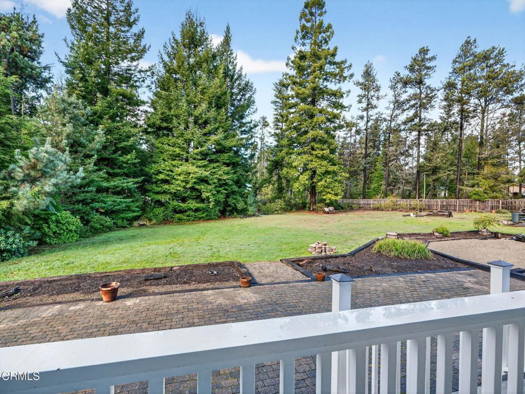 18970 Quail Lane Fort Bragg, CA 95437 - Photo 31 of 36 a view of a yard with table and chairs